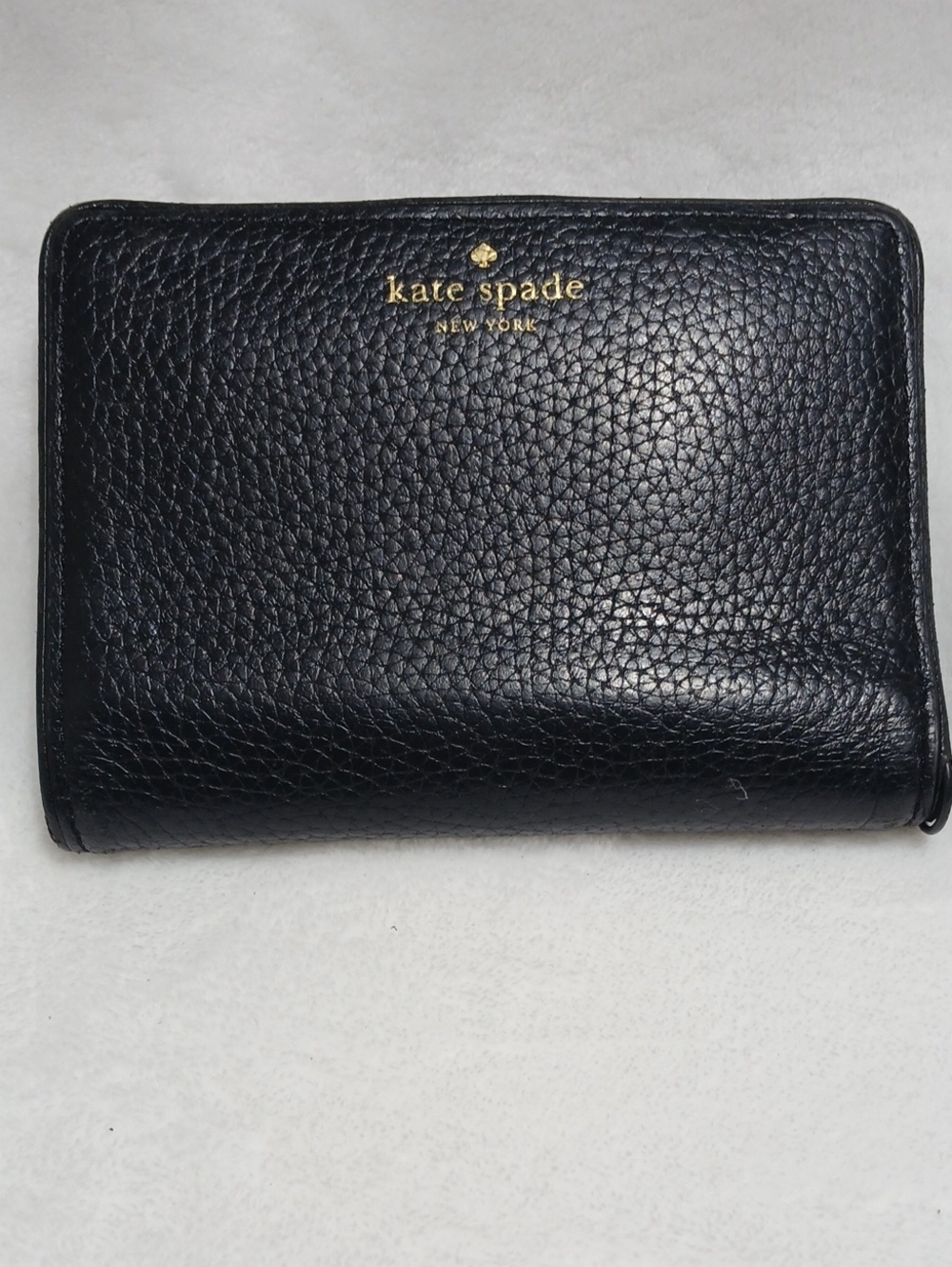 Kate Spade Black Pebbled Leather Bifold Wallet with Gold Logo